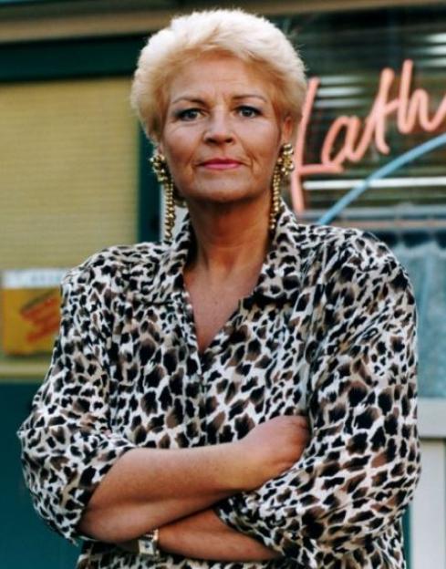 Pat Butcher from EastEnders in a leopard print shirt.