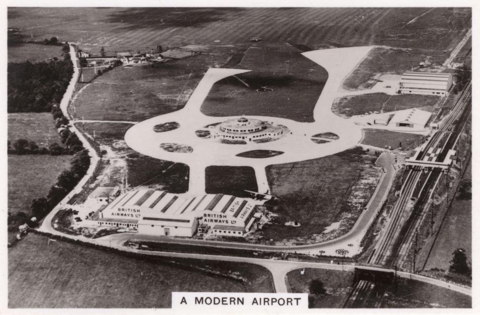 Aerial view of Gatwick Airport's "Beehive" terminal building and rail links.