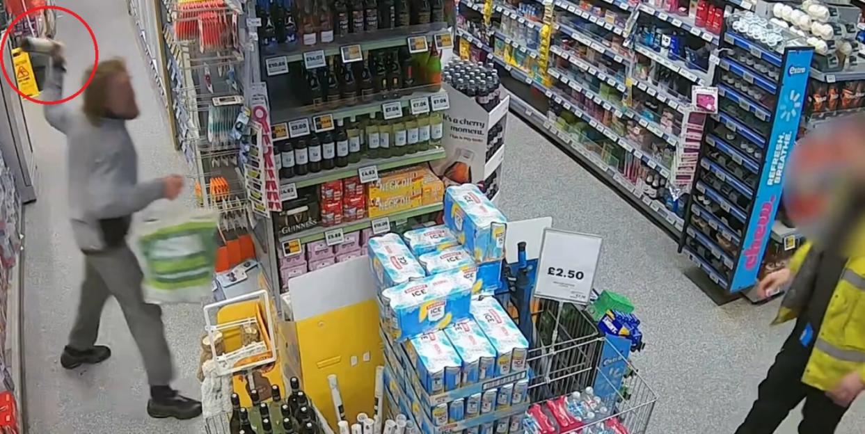 'Disturbing Incident: Thug Menaces Asda Employees with Needles and Wine Bottle Amid Rising Shoplifting Avoidance'