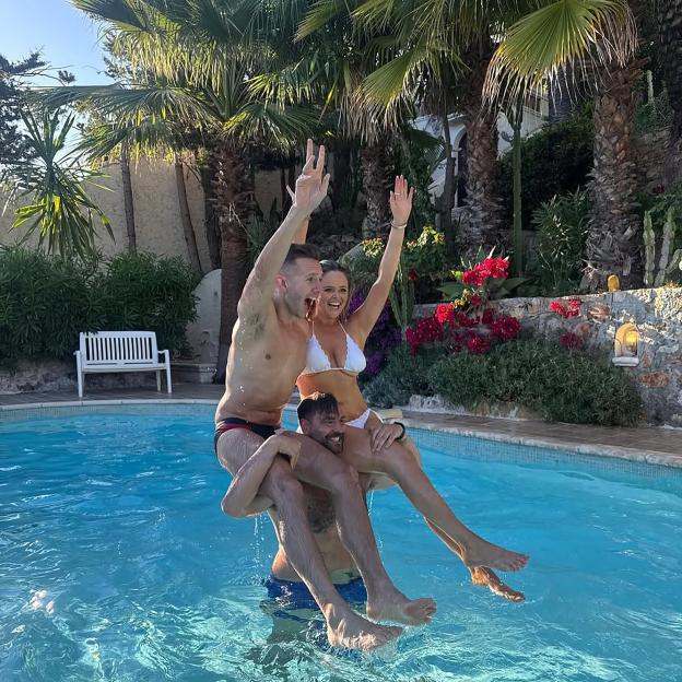 Emily Atack and two friends playing in a swimming pool during her hen do.