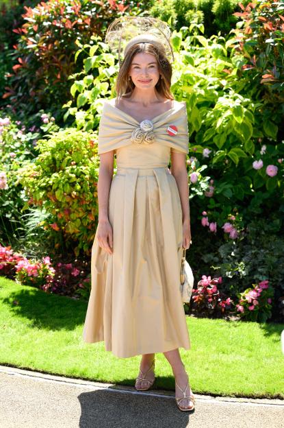 Ascot Partygoers Dazzle in Bold Hats and Stunning Dresses as Day Two of Racing Begins