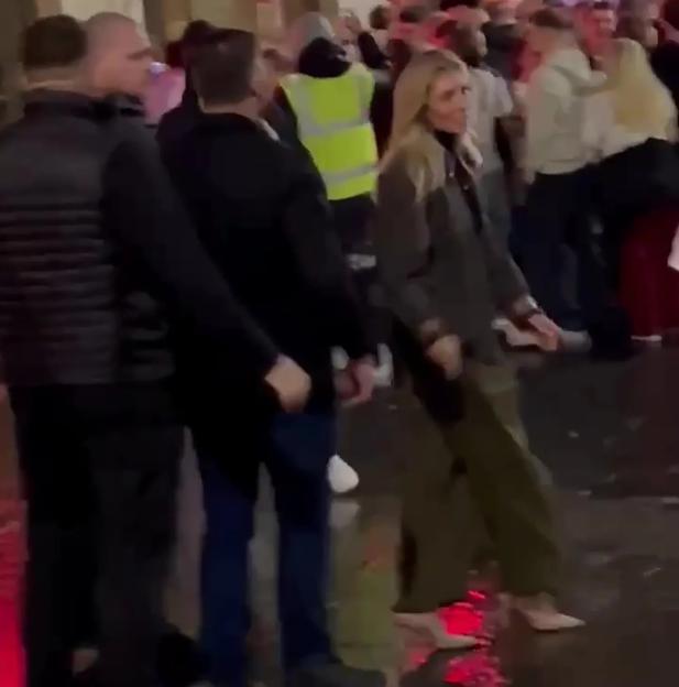 Bonnie Blue walking barefoot through Newcastle's Bigg Market during Freshers' Week.