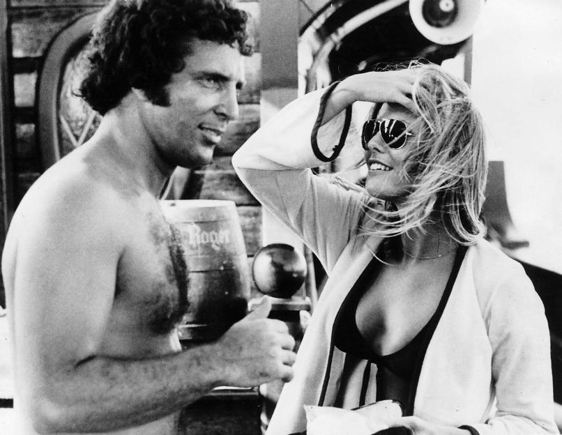 Tom Jones and Marjorie Wallace on a film set.