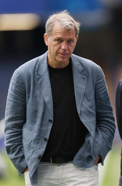 Chelsea owner Todd Boehly looking on during a Premier League match.