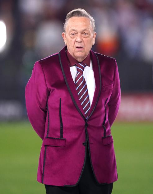 West Ham United chairman David Sullivan in a maroon jacket and striped tie.