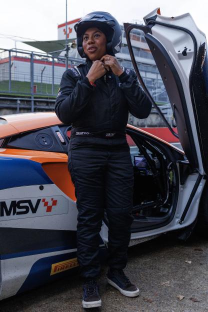 Conservative Leader Kemi Badenoch after a ride in a McLaren race car.
