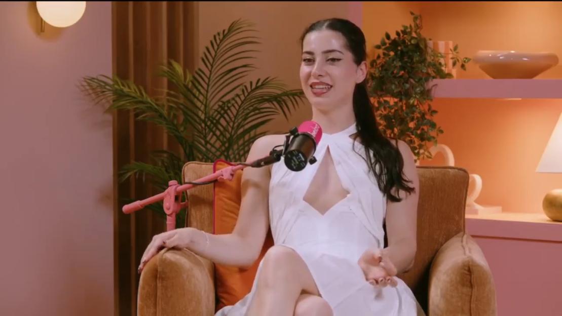 Yasmin Pettet on a podcast, looking slightly offended.