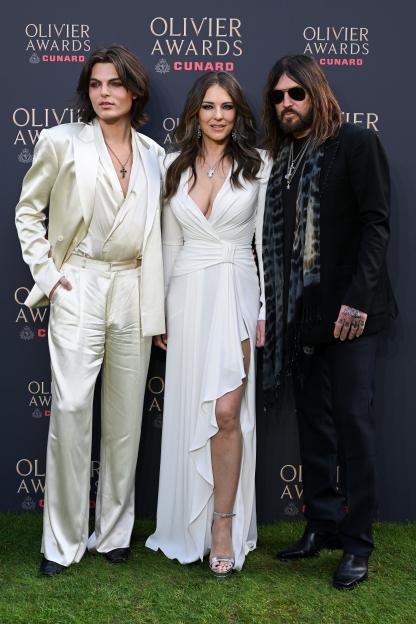 Damian Hurley, Elizabeth Hurley, and Billy Ray Cyrus attending the Olivier Awards 2026.
