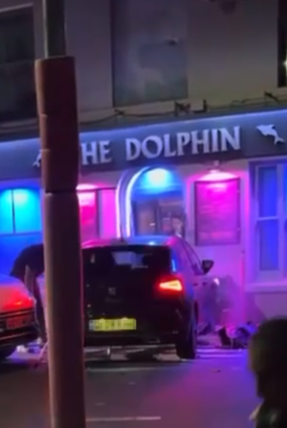 A car rammed into the entrance of "The Dolphin" pub, damaging the building.