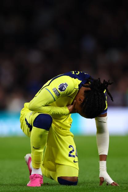 Djed Spence of Tottenham Hotspur celebrates during a Premier League match.