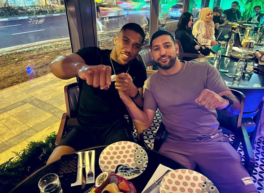 Anthony Joshua and Amir Khan together at a restaurant.