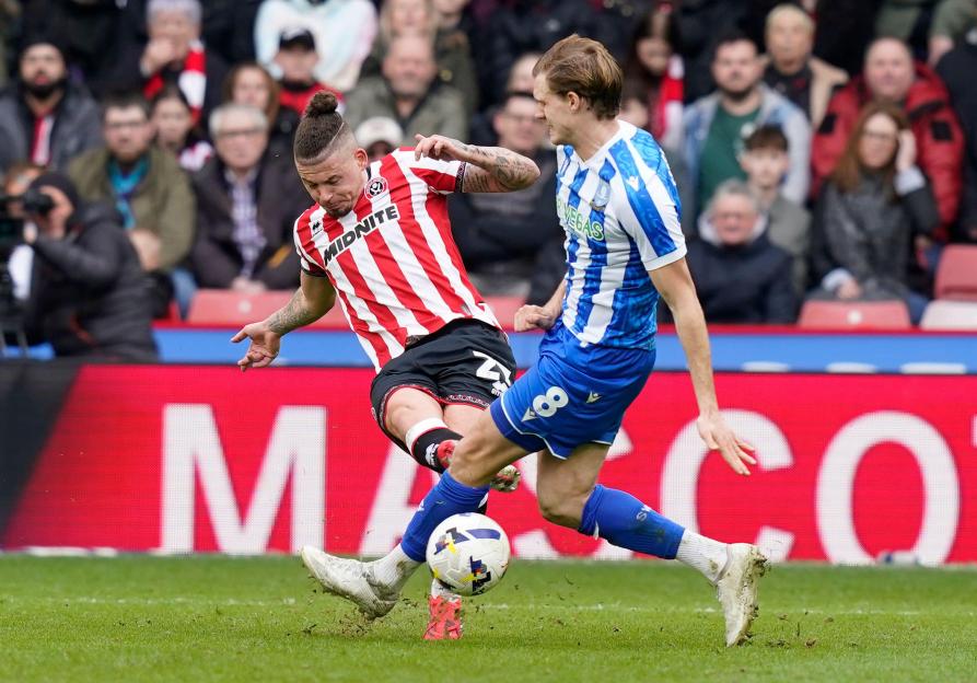Kyle Walker Offers Support to Kalvin Phillips Following Red Card in Intense Steel City Derby