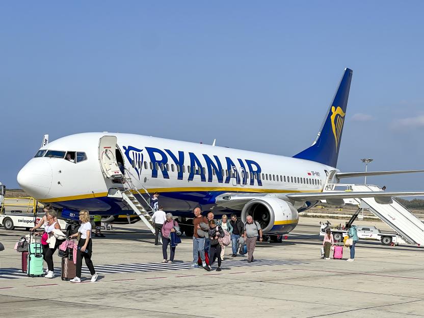 Boeing 737-800 aircraft, used by Ryanair, at Paphos Airport. Passengers disembark