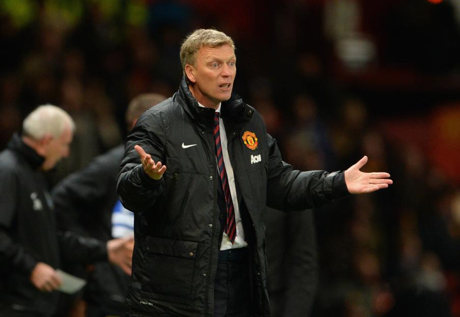 David Moyes reacting from the sideline during a Manchester United vs Everton Premier League match.