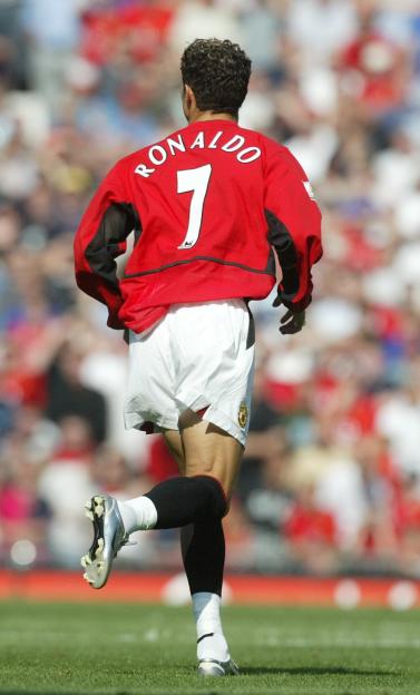 Cristiano Ronaldo, number 7, back view in Manchester United jersey.