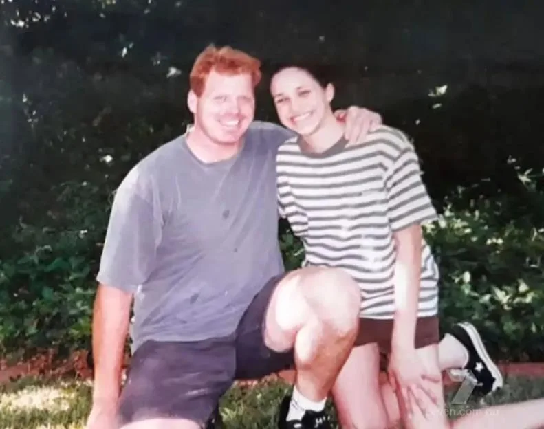A young Meghan Markle posing outdoors with her brother, Thomas Markle Jnr.