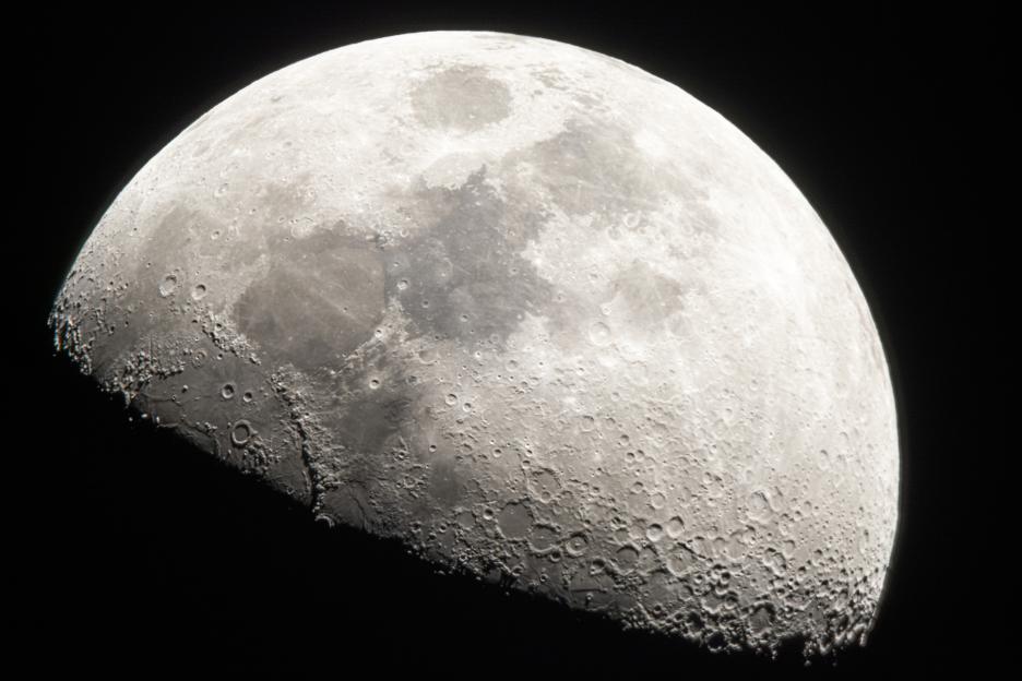 Close-up view of the Moon from the Northern Hemisphere, showing craters and maria.