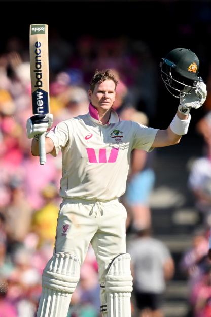 Steve Smith raising his bat to celebrate a century (100 runs) during the 2025/26 Ashes Series.