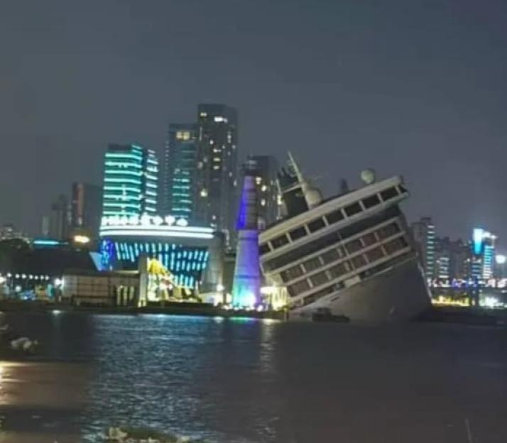 VIDEO: Luxury cruise ship topples over at dock after typhoon hits