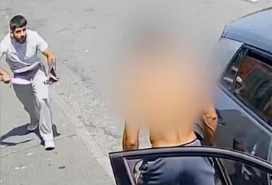 Shocking moment thug pulls huge zombie knife from trousers and stabs man twice in broad daylight street attack after row