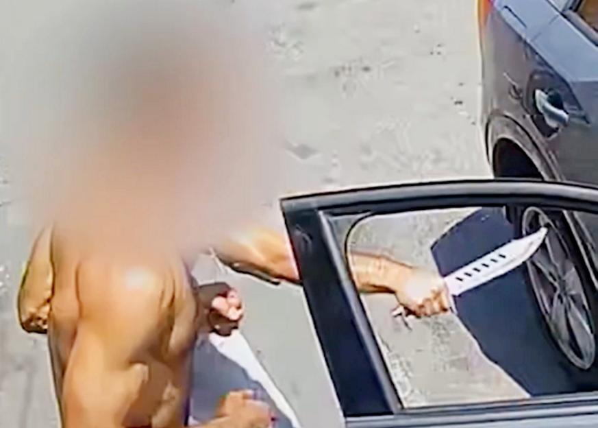Moment thug stabs man twice with zombie knife after row erupts in street