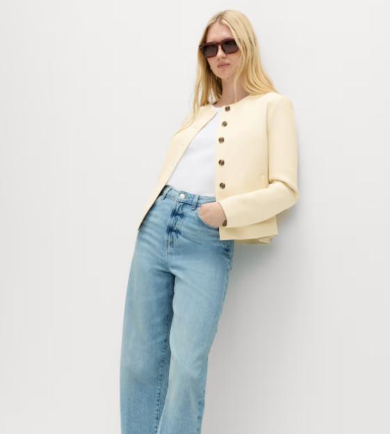 Model wearing an M&S Faux Leather Collarless Jacket.