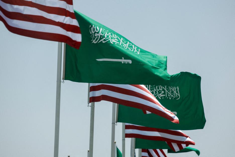 : U.S. and Saudi flags flutter along a highway of Riyadh ahead of the arrival of U.S. President Donald Trump to Riyadh, Saudi Arabia