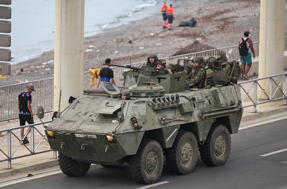 Mass crossings of migrants on foot and by sea from Morocco into Spanish territory, in Ceuta