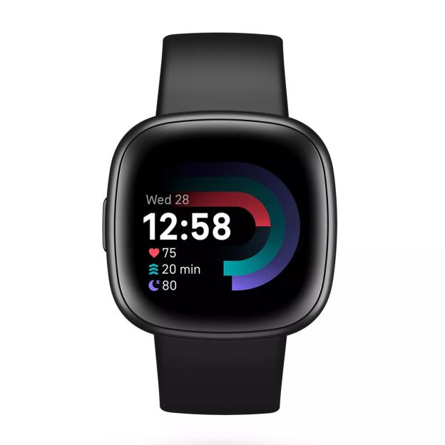 Black Fitbit Versa 4 smartwatch showing time, date, heart rate, active minutes, and sleep score.
