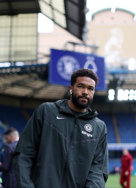 Reece James of Chelsea inspects the pitch.