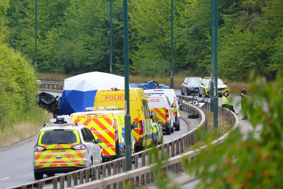 Police vehicles and a forensic tent at the scene of a crash on the A66 South Bank.