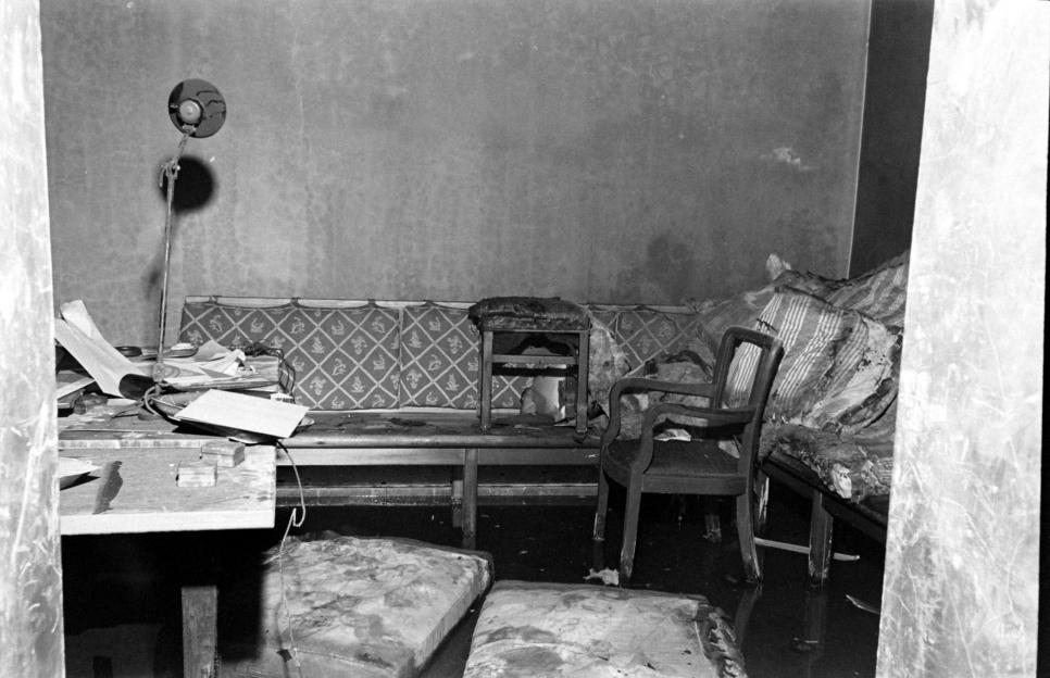 Debris and floodwater cover the floor of the Fuhrerbunker.