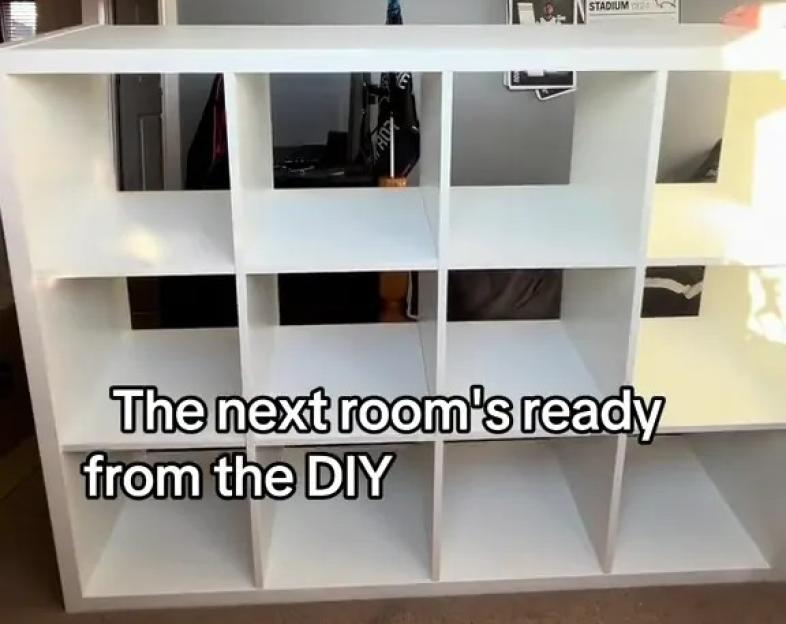 White storage unit as a DIY Barbie house.