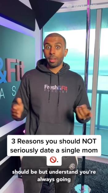 A man in a black "Fresh & Fit Podcast" hoodie speaks to the camera, with text overlayed that reads "3 Reasons you should NOT seriously date a single mom."