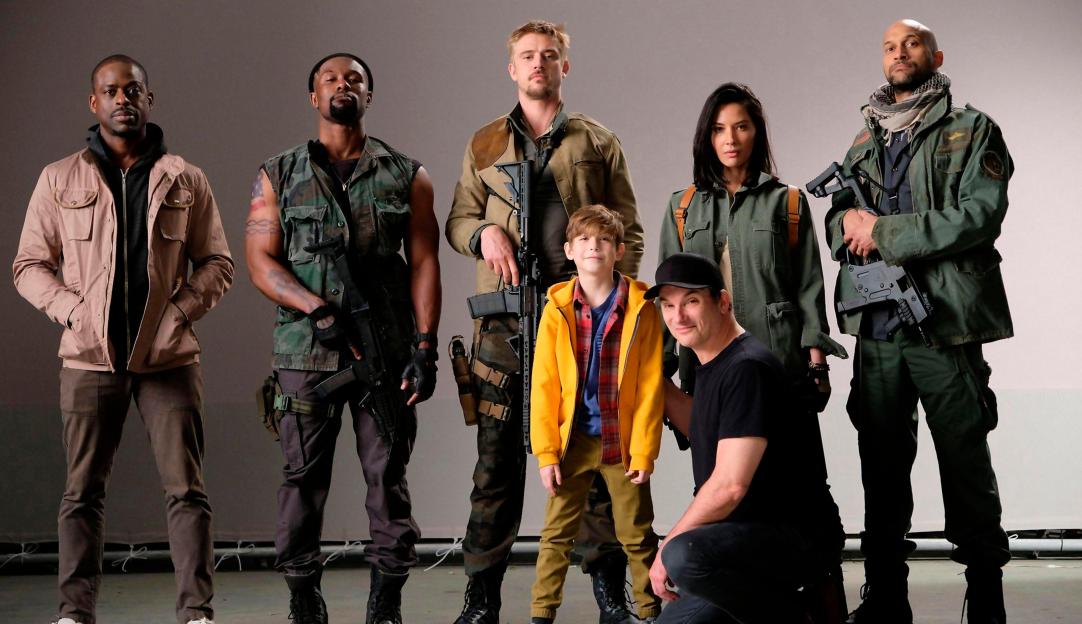 The cast of the film "The Predator" including Shane Black, Olivia Munn, Boyd Holbrook, Trevante Rhodes, and Jacob Tremblay.
