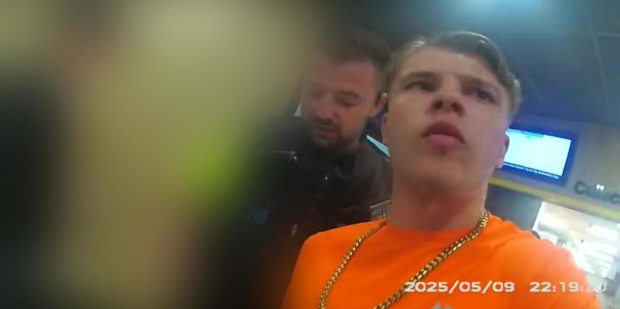 Sonny Boyes being arrested.