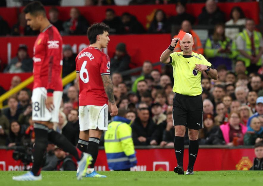 Michael Carrick Expresses Frustration Over Key Decisions in Manchester United's Loss to Leeds and Teases Lisandro Martinez Appeal