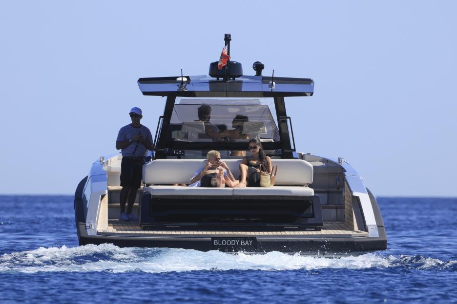 *PREMIUM-EXCLUSIVE* MUST CALL FOR PRICING BEFORE USAGE - Sir David Beckham and Victoria Beckham were spotted soaking up the sunshine during a glamorous family getaway in Ibiza over the Bank Holiday Weekend, joined by son Romeo Beckham, his girlfrien