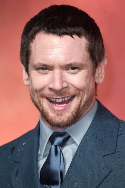 Jack O'Connell smiling at the world premiere of "28 Years Later: The Bone Temple".