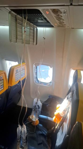 A broken window and the interior of the Ryanair aircraft, following a reported emergency landing, in location given as Thessaloniki