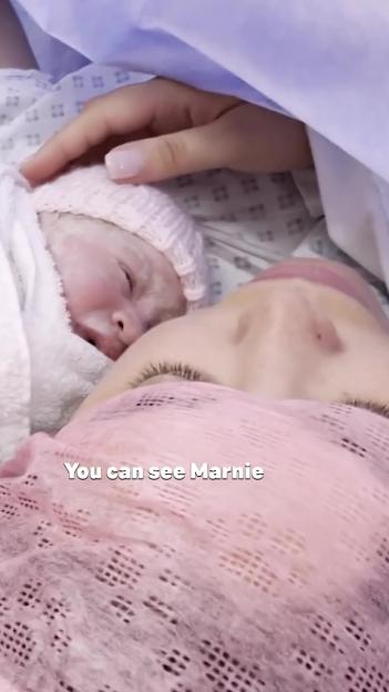 Marnie Simpson and her newborn baby.