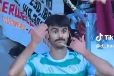 Bizarre moment Celtic star almost strangled as neck gets tangled in rival fan’s flag just 15 minutes into return to club