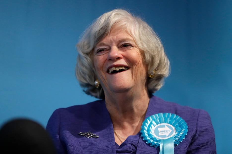 Ann Widdecombe, a Brexit Party member, smiling while wearing a Brexit Party rosette.