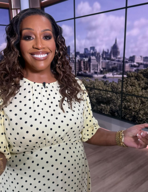 Alison Hammond in a yellow polka dot dress.