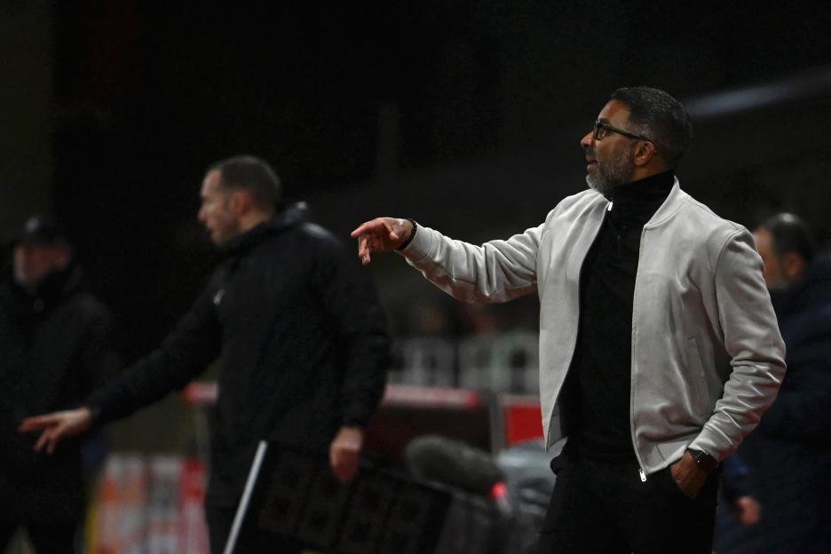 Marseille's head coach Habib Beye gestures from the technical area.