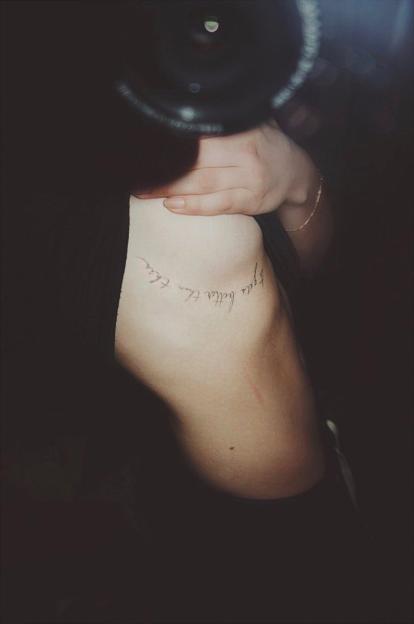 Chloë Grace Moretz's rib tattoo that reads "It gets better than this".