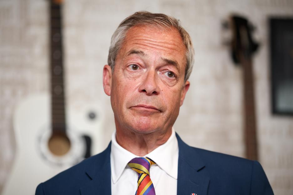 Nigel Farage, leader of Reform UK, speaking to the media in St Helens, England.