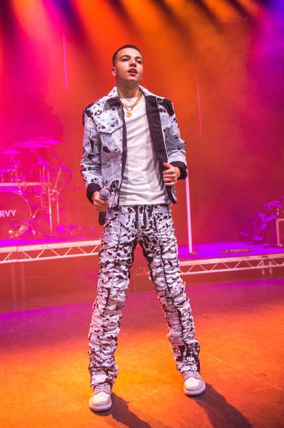 Junior Andre performs on stage at O2 Shepherd's Bush Empire.