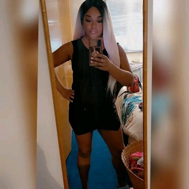 Ria Miswell posing for a mirror selfie.