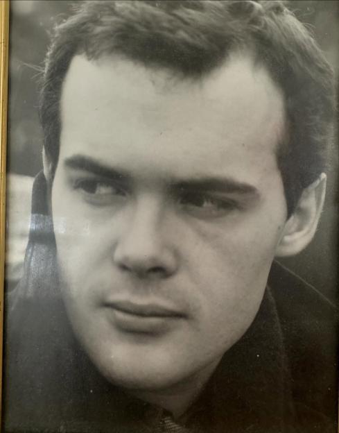 Black and white framed photo of Peter, Lizzie Cundy's brother, looking towards the right side of the frame.